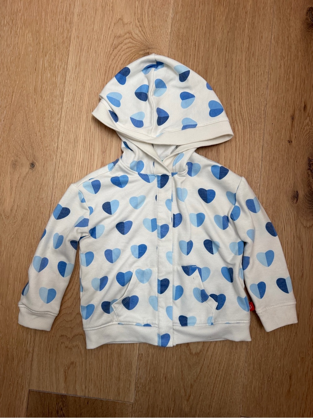 Magnetic Me White Hoodie with Blue Heart Print